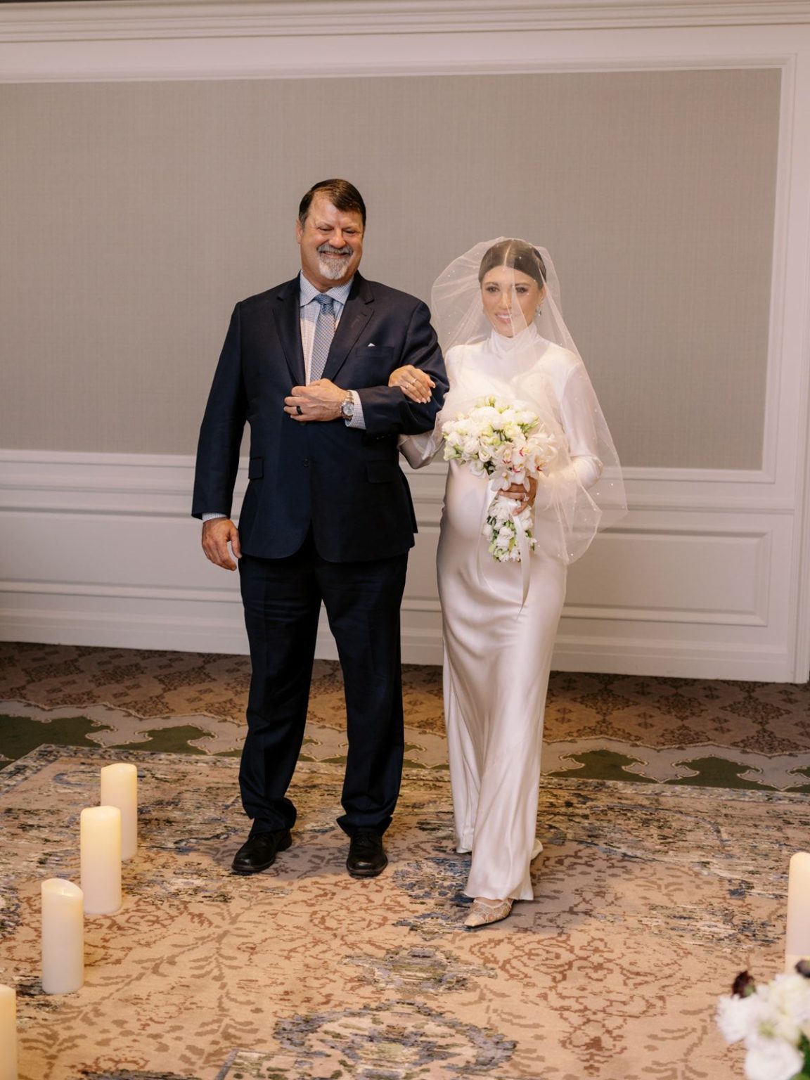 Marisa and Ashton's winter wedding at The St. Regis Aspen: the ceremony in the Capitol Room