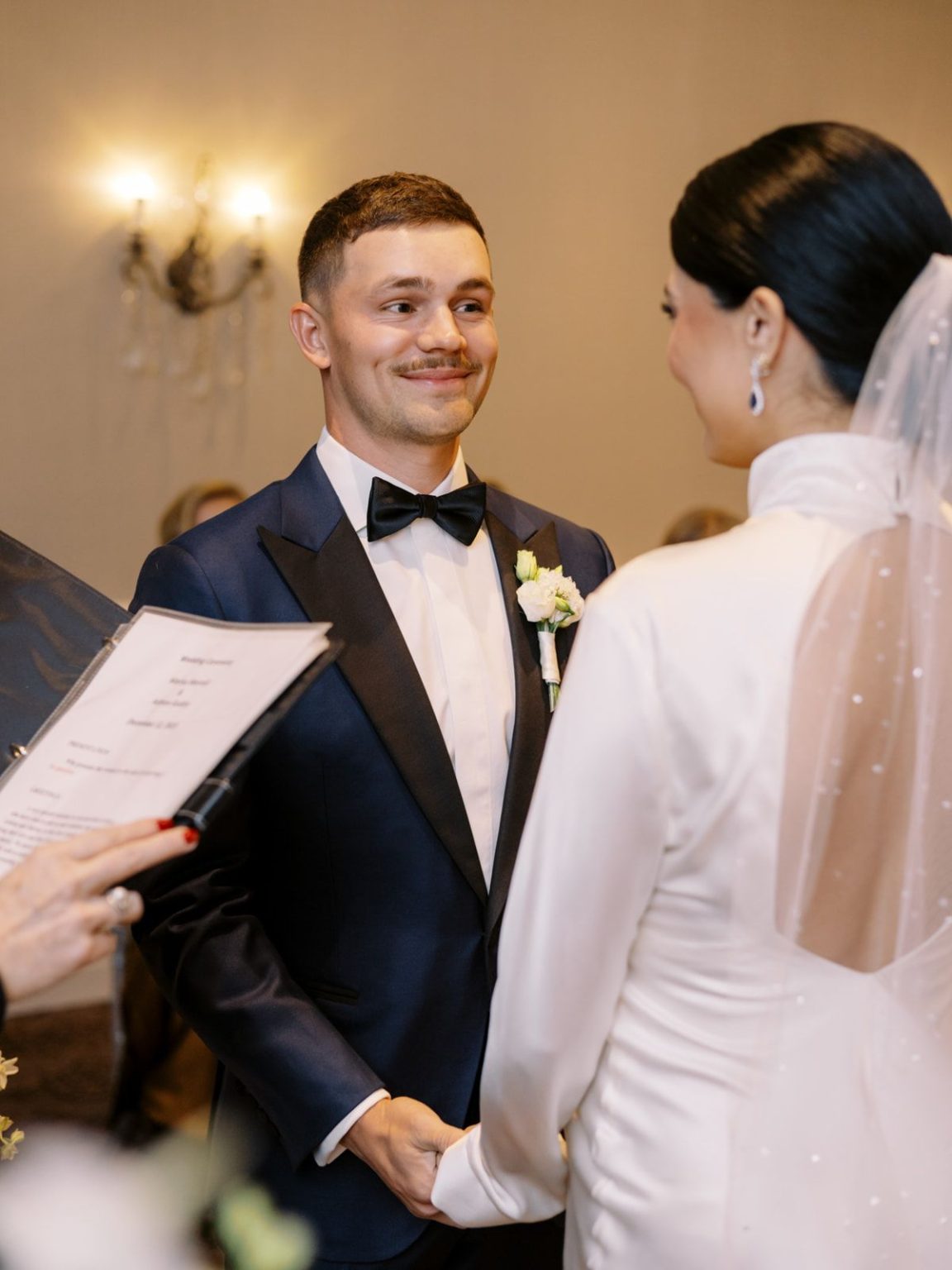 Marisa and Ashton's winter wedding at The St. Regis Aspen: the ceremony in the Capitol Room