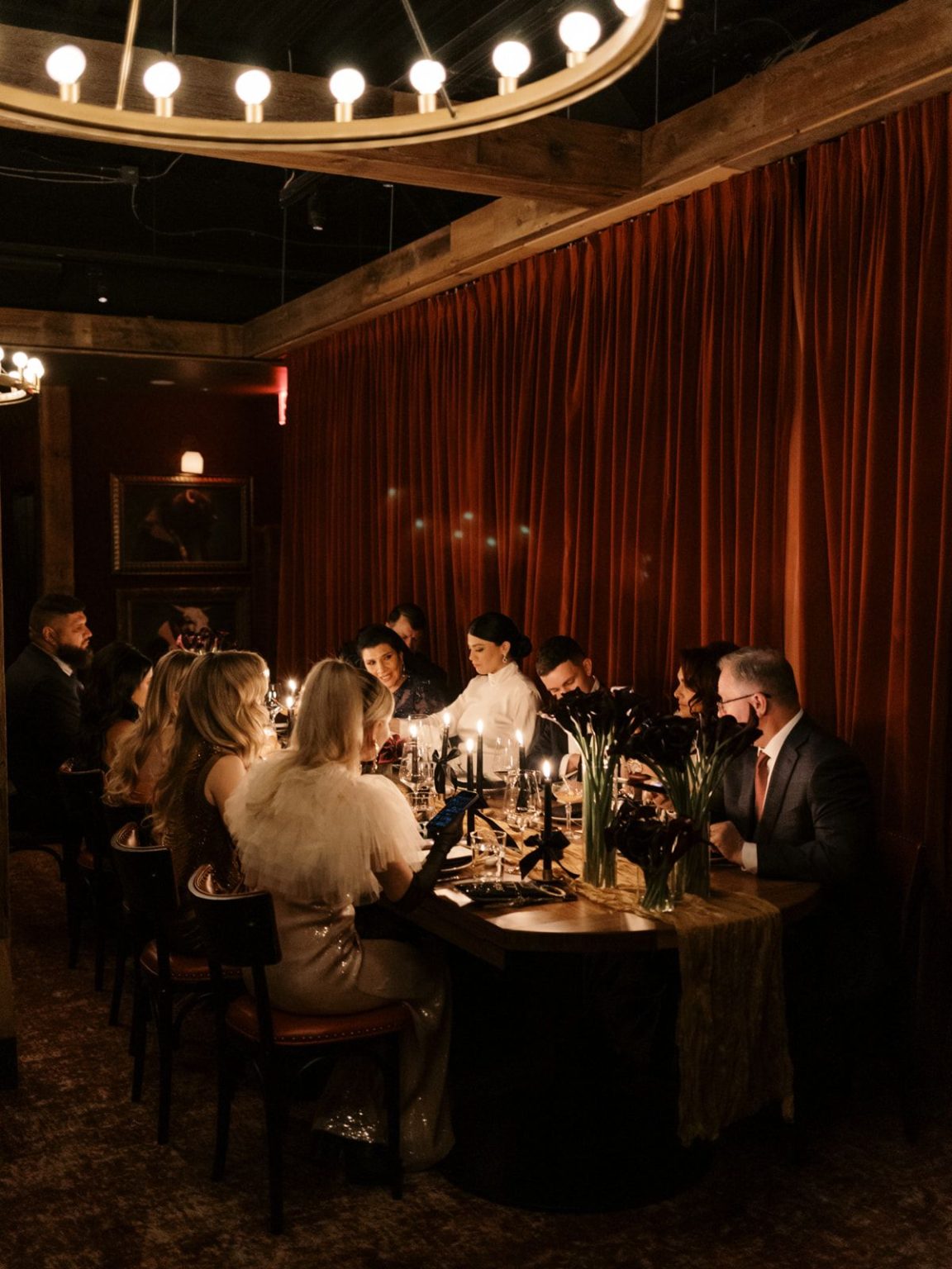 Marisa and Ashton's winter wedding at The St. Regis Aspen: dinner in the Red Room at Catch Steakhouse