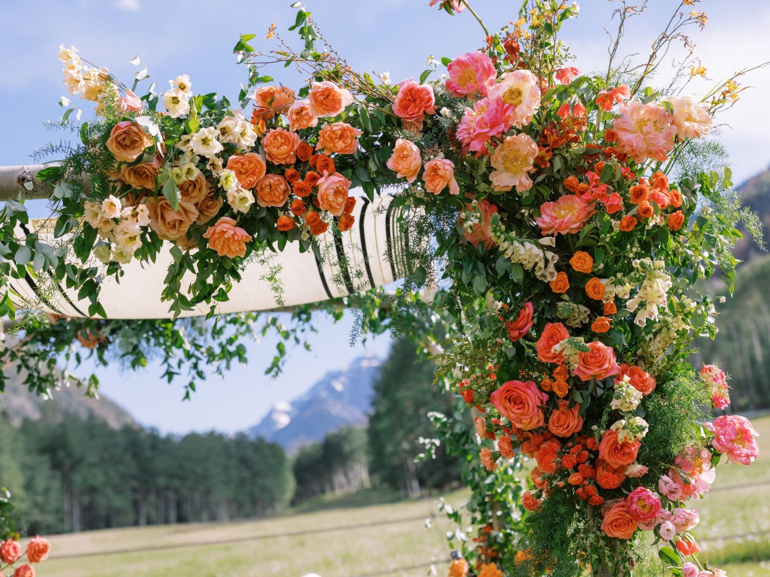 A summer wedding at T Lazy 7 Ranch, Aspen: ceremony and floral details