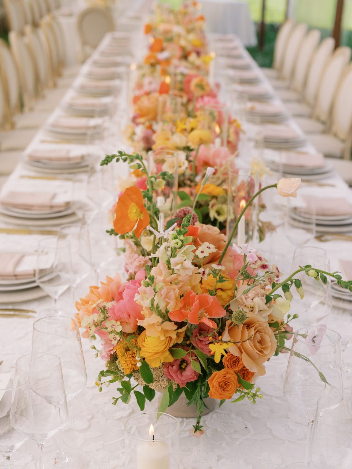 A summer wedding at T Lazy 7 Ranch, Aspen: florals down the reception table