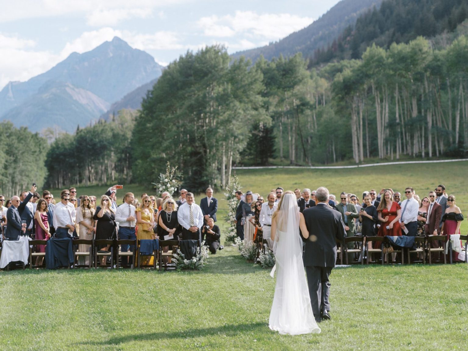 Meredith and Jason's wedding at T Lazy 7 Ranch, Aspen: the ceremony in the meadow