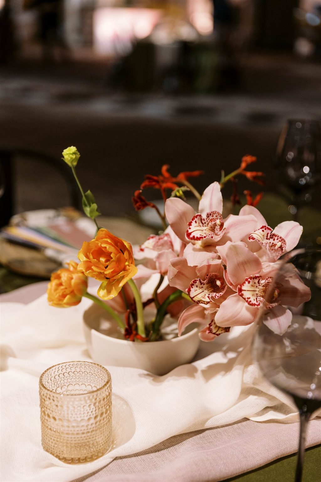 WIPA Colorado Gala in Aspen: a pink and yellow orchid centerpiece